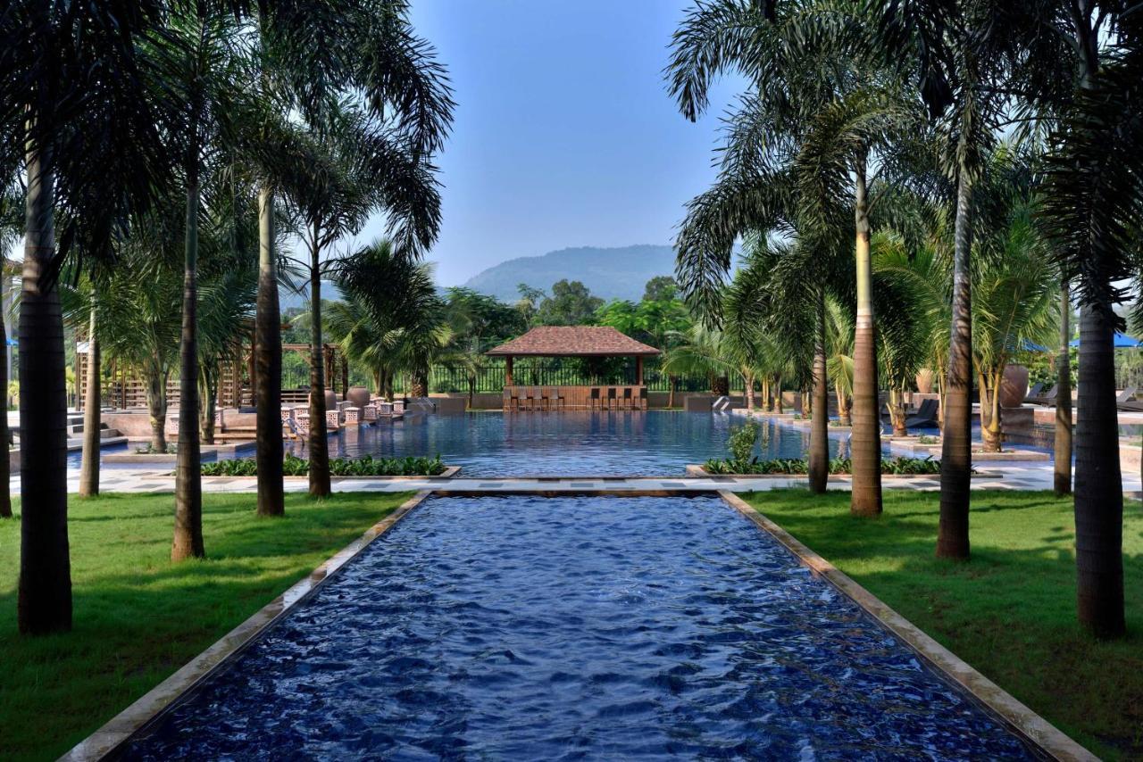 Radisson Blu Plaza Resort & Convention Centre Karjat Exterior photo The pool at the Anantara Golden Triangle Resort