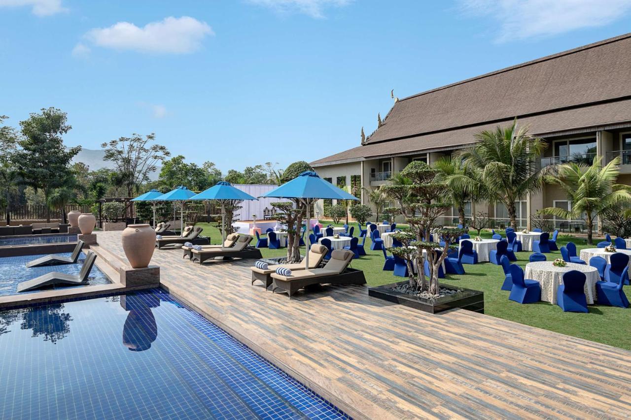 Radisson Blu Plaza Resort & Convention Centre Karjat Exterior photo The pool at the hotel