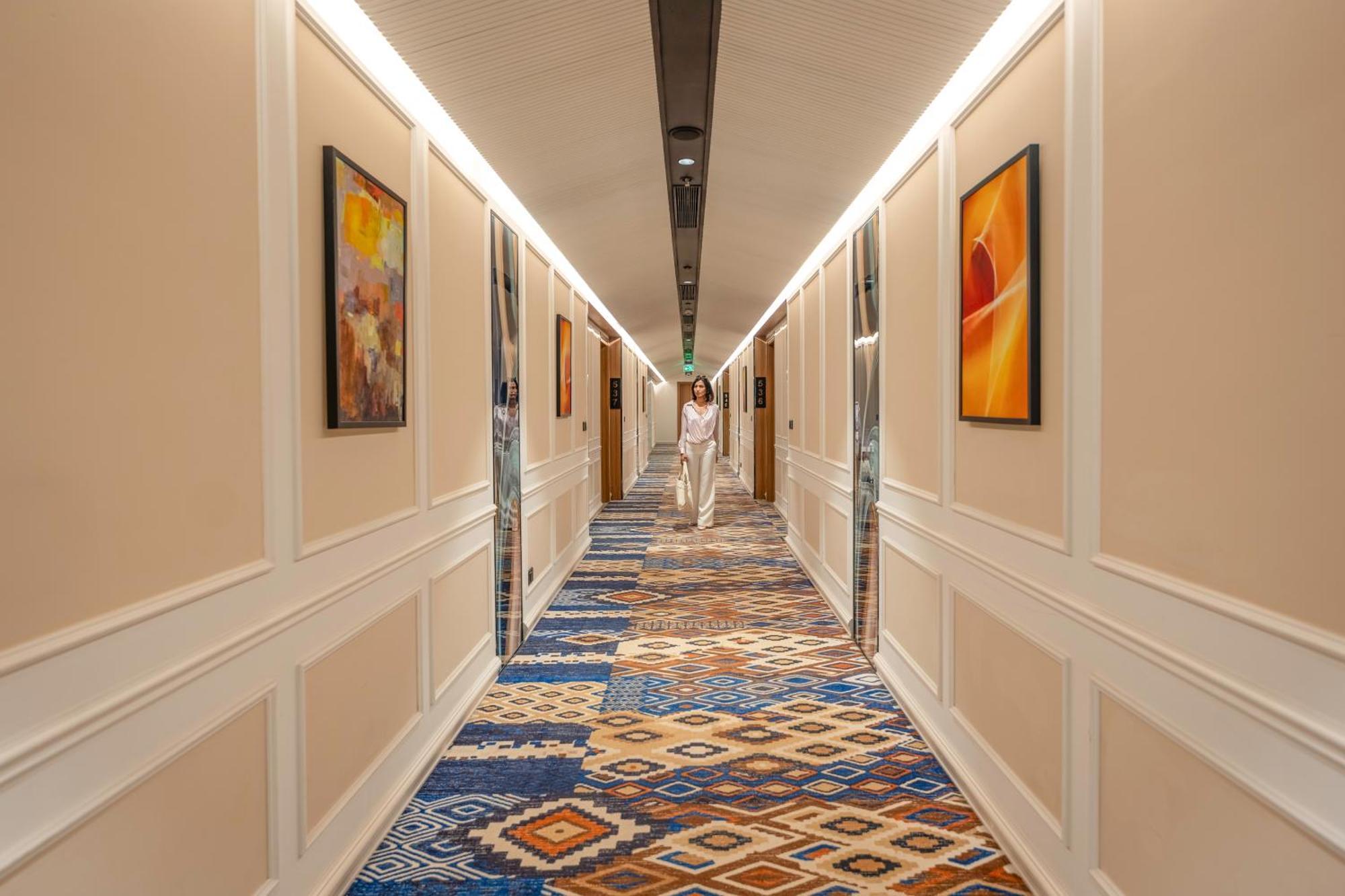 Radisson Blu Plaza Resort & Convention Centre Karjat Exterior photo A corridor at the hotel